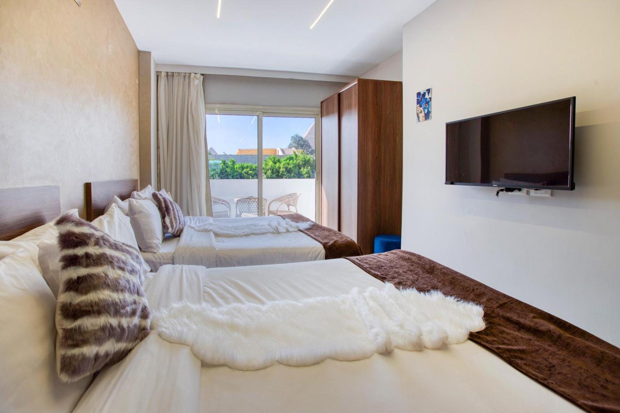 Tree Lounge Pyramids View Inn , Sphinx Giza Kafrat al Jabal ภายนอก รูปภาพ